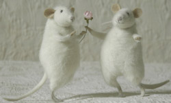 Image of a Mouse giving another Mouse a Flower